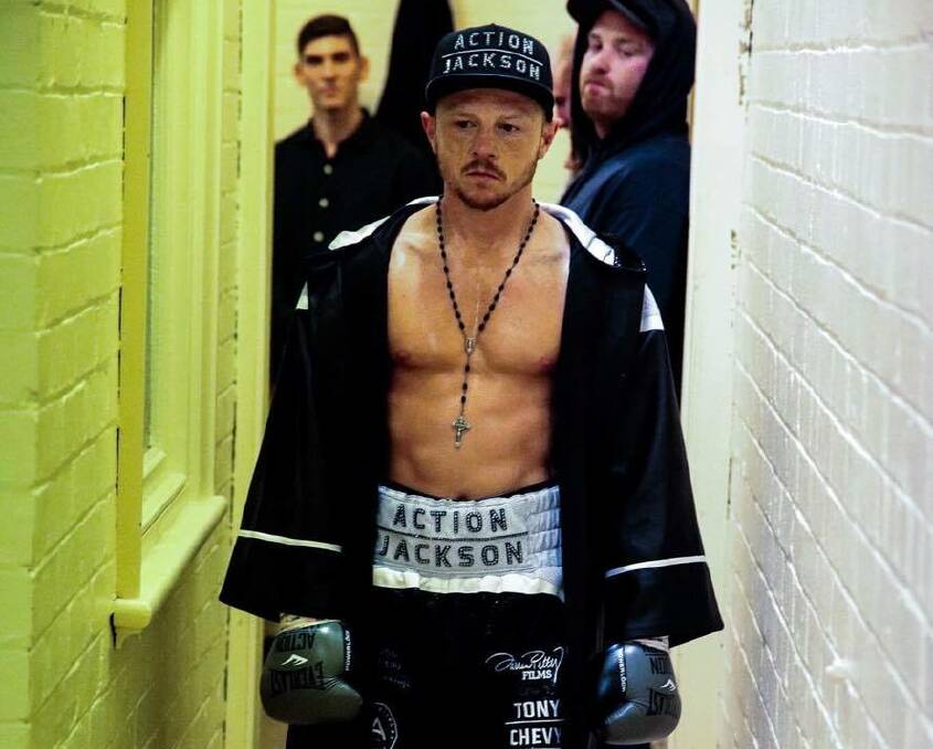IT'S TIME: Luke Jackson walks out of his changeroom to the ring. Pictures: Black Snow Images