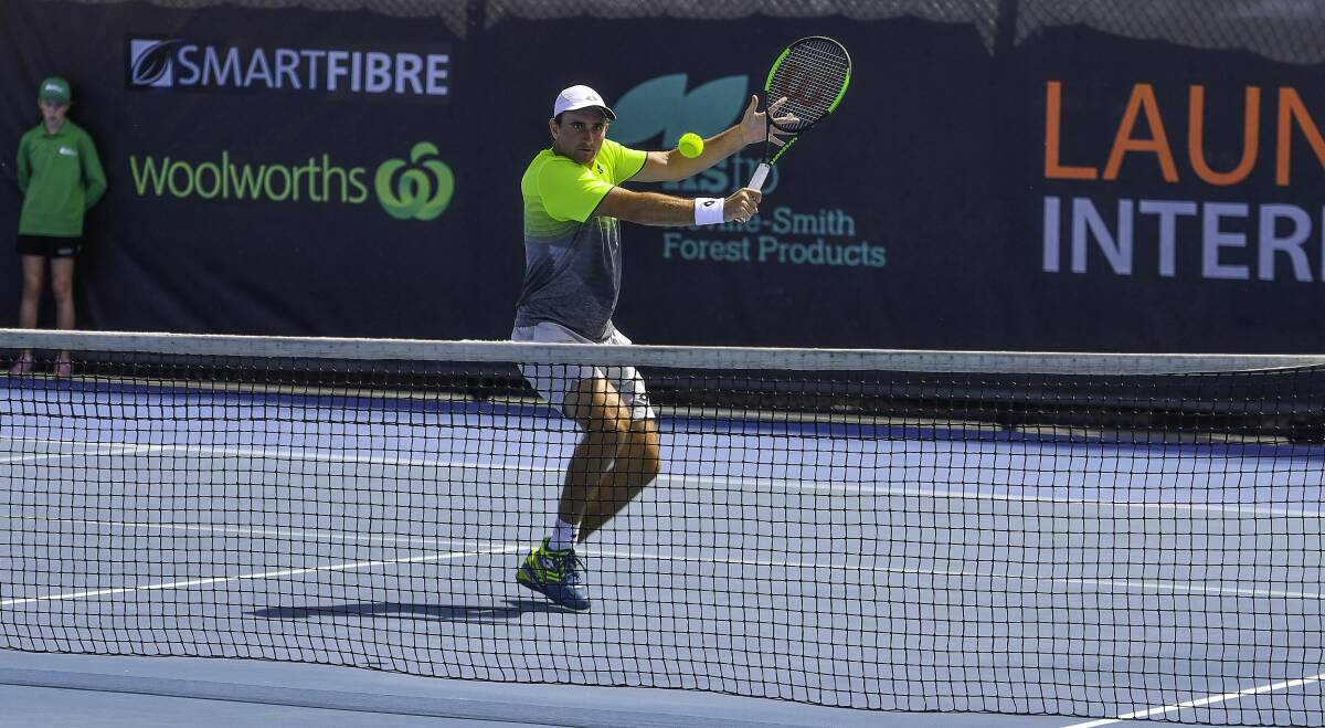 FINE TOUCH: South Australian Brad Mousley comes to the net during his tough singles semi-final win over top-seeded Spaniard Marcel Granollers on Saturday at the Launceston International. Pictures: Scott Gelston