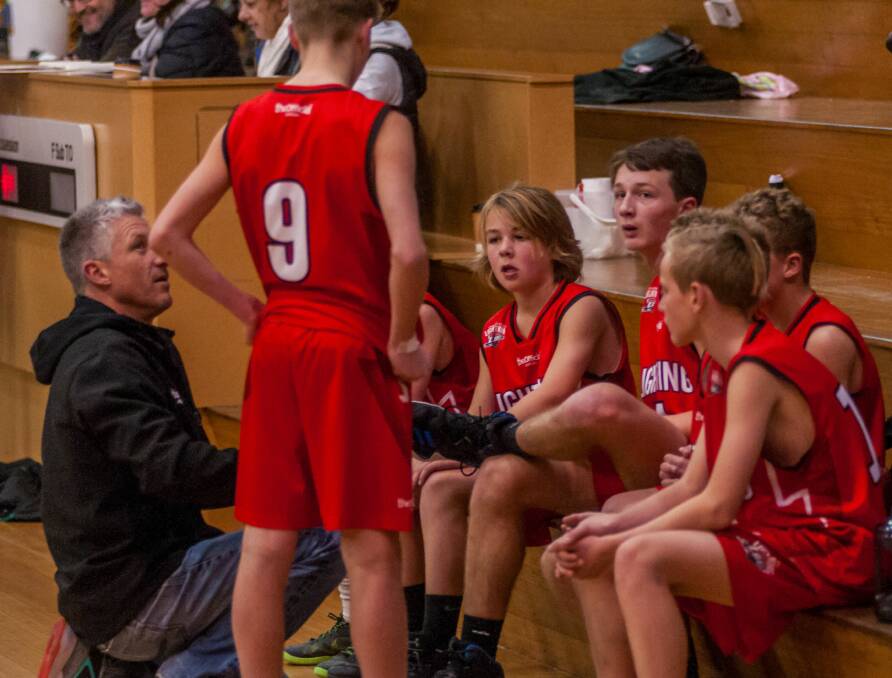 BREATHER: Launceston Lightning's boys discuss team tactics in a break during this year's state under-14 basketball championships that were held in Launceston on both Saturday and Sunday. Pictures: Phillip Biggs
