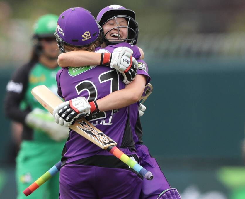 CELEBRATE: Corinne Hall and Emma Thompson steer the Canes to last-gasp win.
