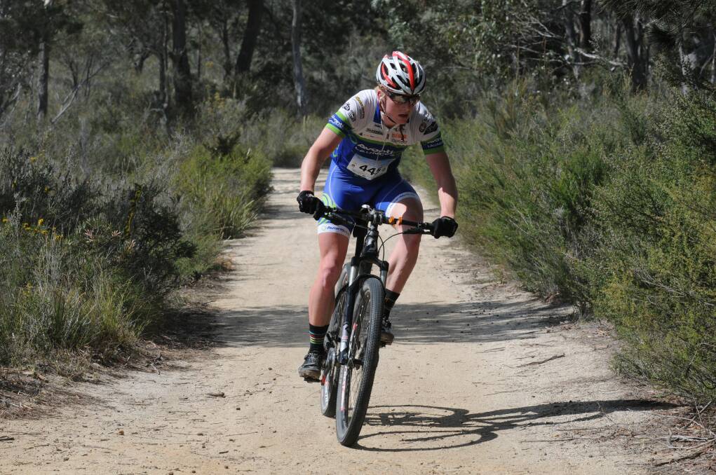 BACK THEN: Freycinet Challenge, as it was back in 2013, when entrant Shane Matthews rounded a corner on one of the dirt tracks of the old course. Picture: Paul Scambler