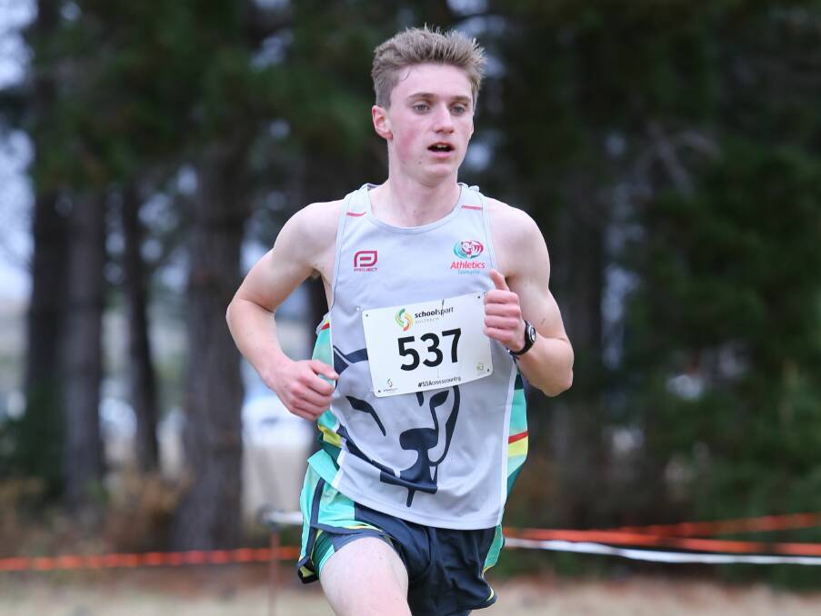 OUT IN FRONT: Riverside High School runner Sam Clifford maintains a healthy, growing lead over his 14-to-15-year-old interstate rivals in Hobart. 