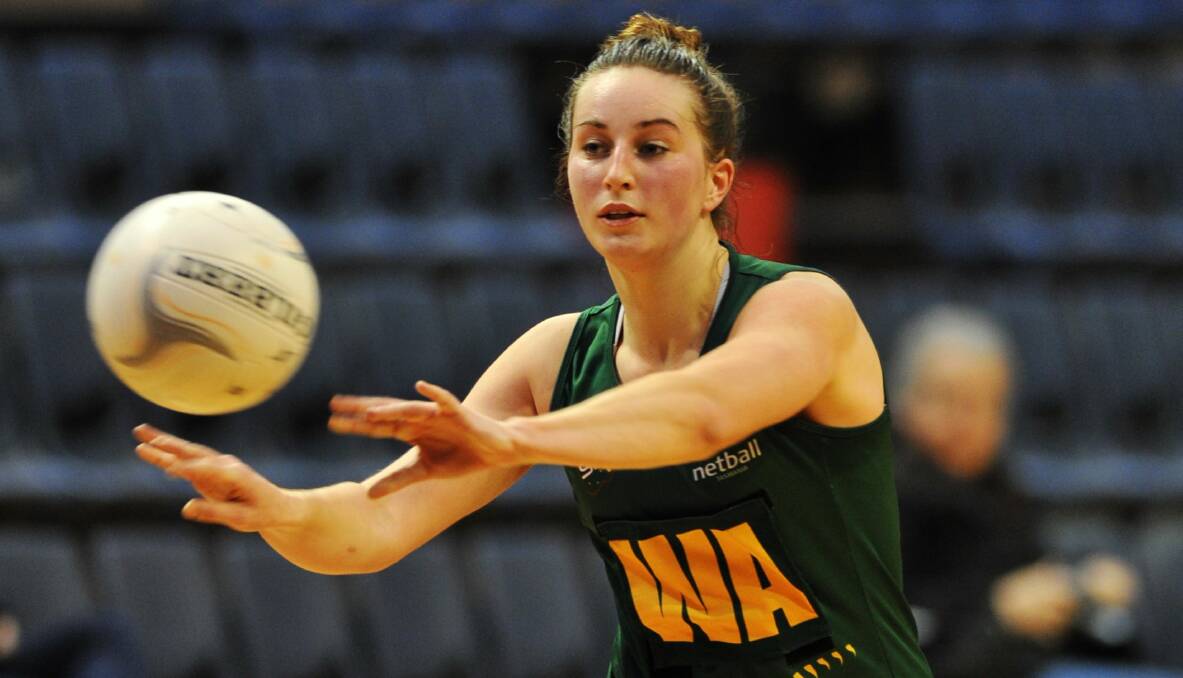 STATE PRIDE: Hayley Sansom in action for Tassie Spirit back in 2014 at the Silverdome.