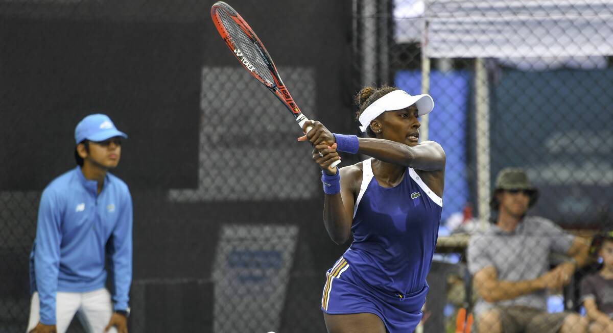 PACKING A PUNCH: Asia Muhammad hits a winner in her convincing straight-sets victory over Irina Khromacheva. 