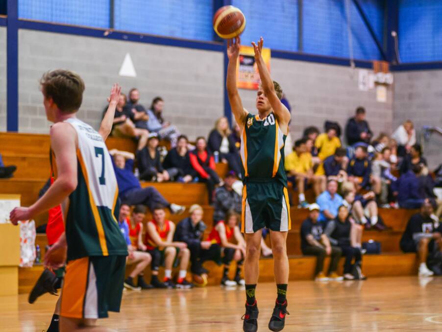COOL AS: St Patrick's College shooter Cohen Reaburn takes his shot during Saturday's group stages.