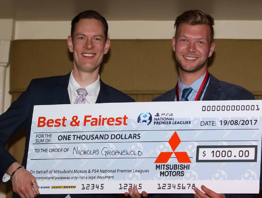 WINNERS ARE GRINNERS: Mitsubishi Medalist Nicholas Groenewold (right) accepts the prize for his standout NPL Tasmania season. Picture: Solstice Digital