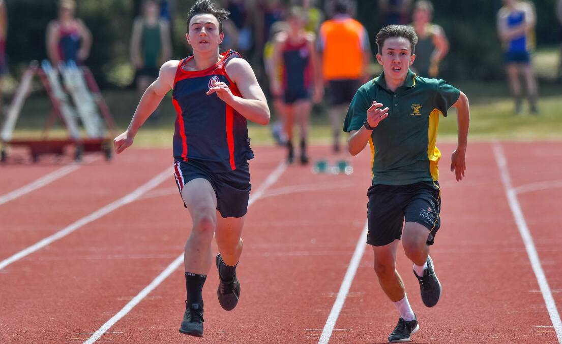 NECK AND NECK: Queechy High dasher Jack Wise begins to pull away to win the grade 10 boys' 100m.
