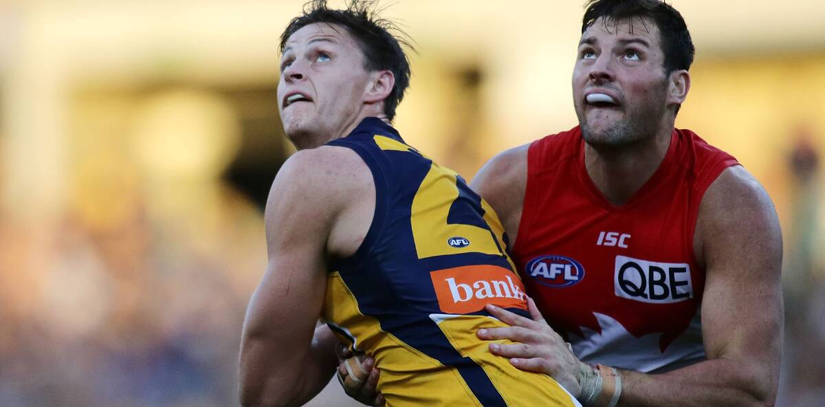 IRONY: Toby Nankervis wrestles former West Coast ruckman Callum Sinclair before the Eagle moved to Sydney, forcing the ex-North Launceston star to seek greener pastures.