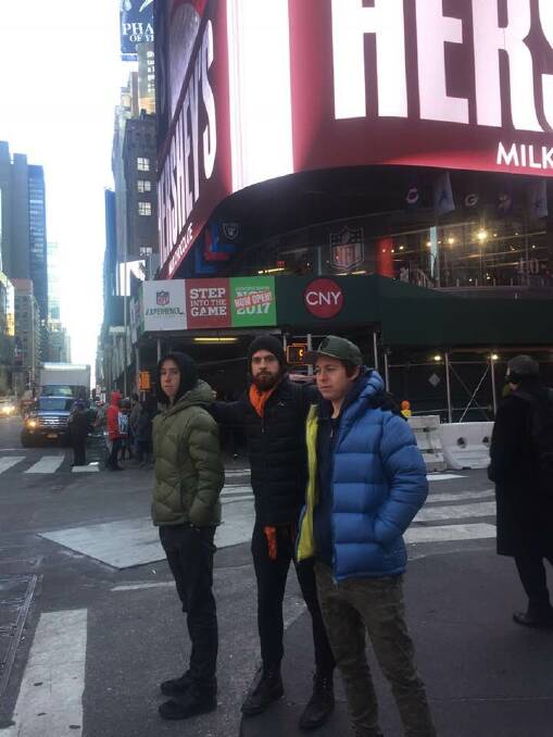 High alert: Frankie, Andrew and Monty Roberts in New York after the Terror attacks, reporting that the streets remained calm. Picture: Supplied 
