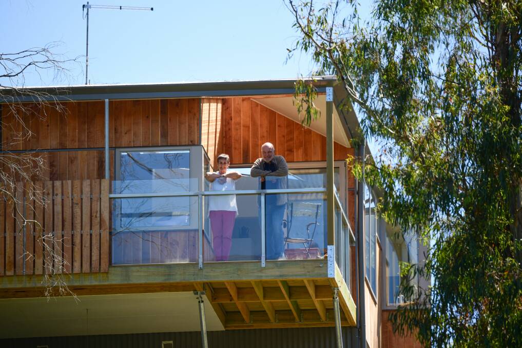 Peter and Tessa Greiner on the balcony of their Trevallyn home. Pictures: Paul Scambler