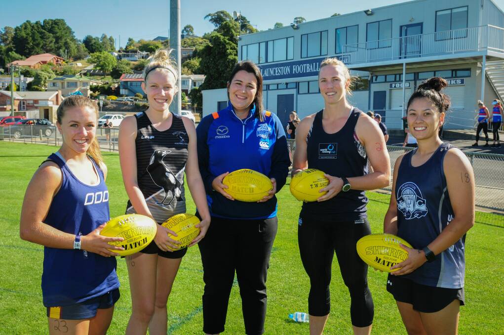 Talent: Amy Halaby of Launceston, Talisha Wooley of Scottsdale, North Melbourne Football Operations Manager Laura Kane, Meaghan Volker of Launceston, and Naomi Celebre of Launceston. Picture: Paul Scambler