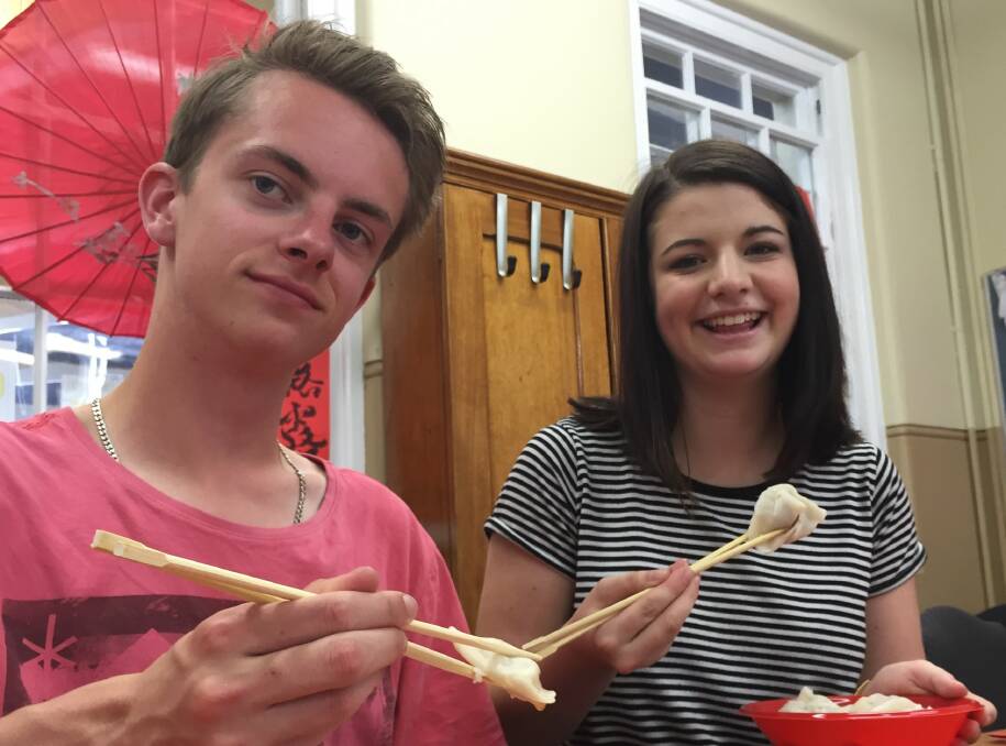 From Launceston to China: James Britton and Bronte Hume are preparing for a gap year teaching English in China. 