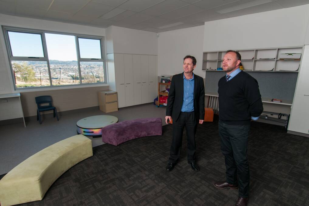Reform: Department of Education Learning Services Operations Manager Craig Woodfall and Northern Support School association chairman Brent Colgrave inspect the new campus. Picture: Phillip Biggs