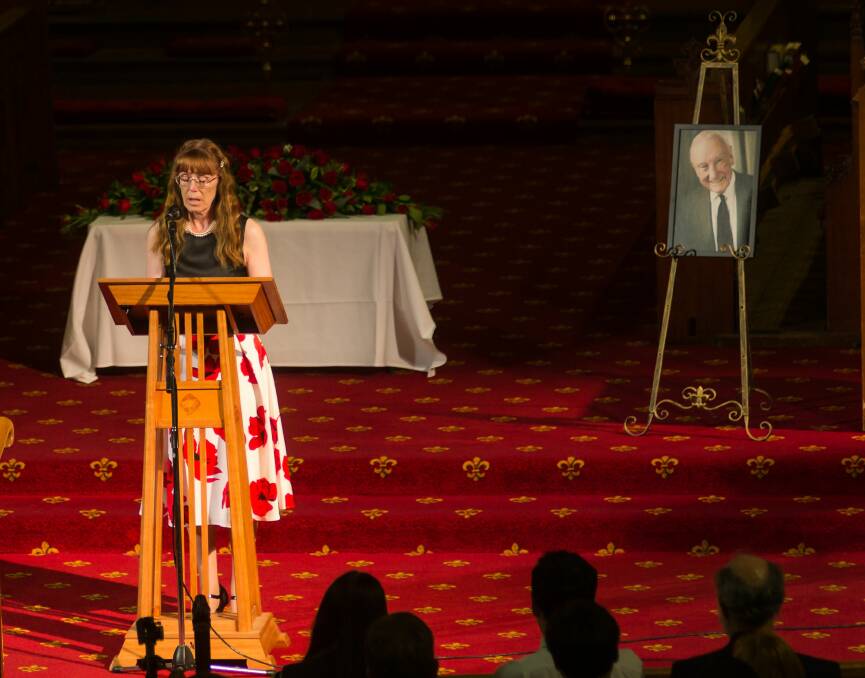 Farwell: Melanie Morris reads from 1 Corinthians at Dr John Morris' celebration of life at St John's Anglican Church on Monday. Dr Morris and his wife Judy attended the church for many years. Picture: Phillip Biggs
