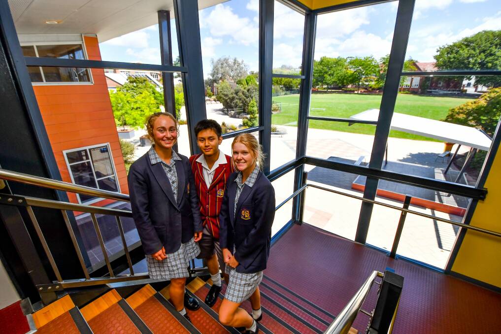 Grade 12: Three students from differing backgrounds with a similar goal of medicine careers. Picture: Scott Gelston