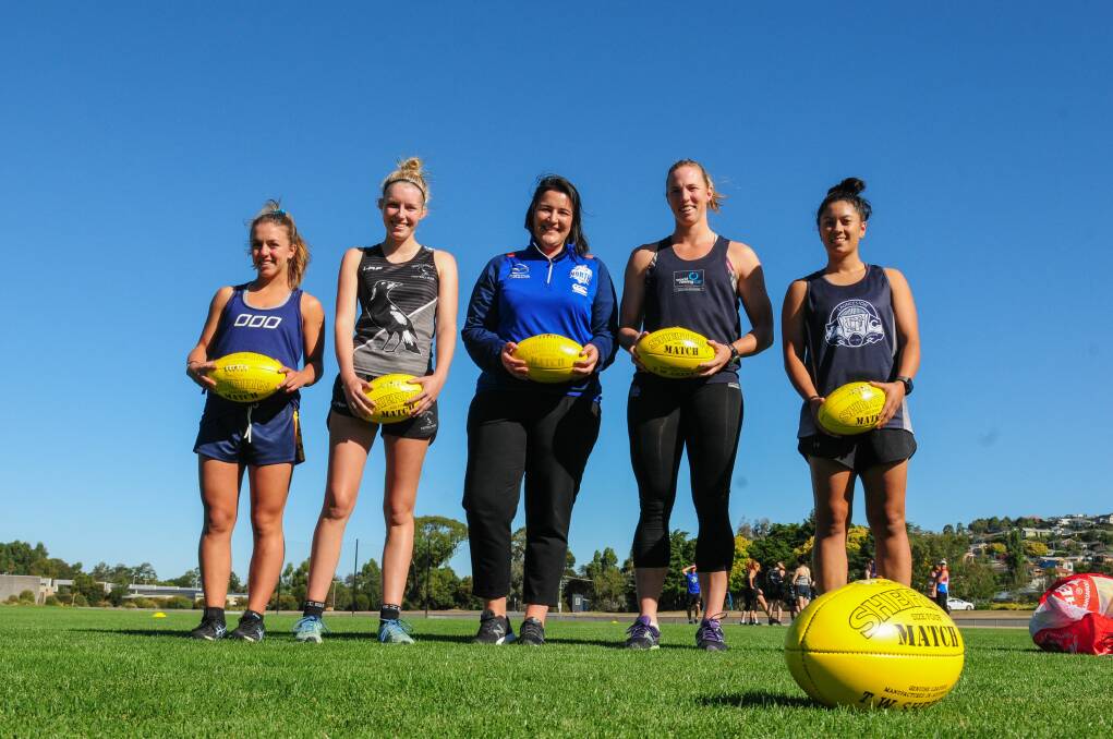 Talent goals: Amy Halaby of Launceston, Talisha Wooley of Scottsdale, North Melbourne Football Operations Manager Laura Kane, Meaghan Volker of Launceston, and Naomi Celebre of Launceston. Picture: Paul Scambler