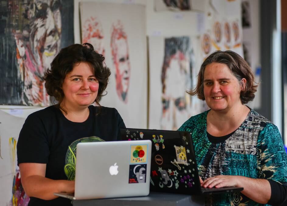 50,000 words: Joee Kolk, of Launceston, and Monissa Whiteley, of Riverside, at a "write-in" at the Powerhouse Gallery, Inveresk. Picture: Phillip Biggs