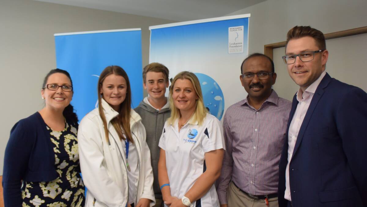 Diving for a cure:  Dr Jess Holien, Charlea, Beau and Tach Malkin, Dr Mohamed, and Leukaemia Foundation general manager Ash Knop.