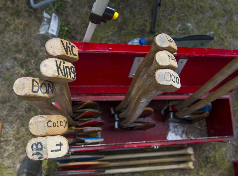 Waiting: Axes stand ready for selection, blades sharpened and ready for work in the arena. A quality racing axe will cost about $600.