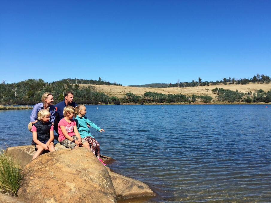 Swim safe: Bass Liberal MHA Sarah Courtney, Northern Aquatic Club vice president Damian Causby, and Archie, Spencer and Lexi Taylor at Lake Trevallyn. Picture: Lucy Stone