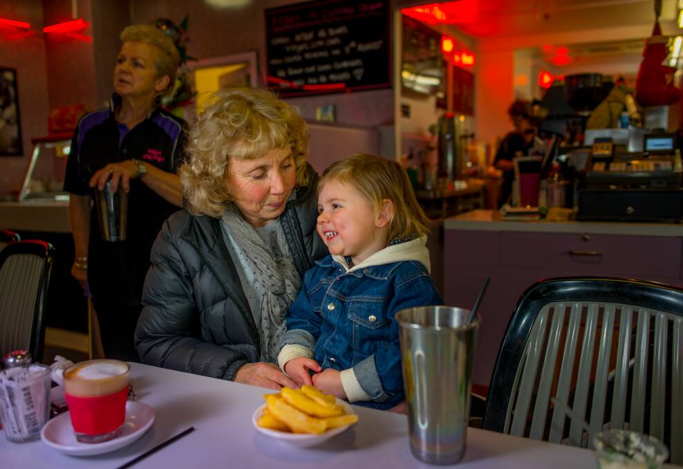 Generations: Susan Amerikanos and Ada Amerikanos, 2, enjoy lunch at Fitzies on a Thursday, with Lorraine French in the background. Pictures: Scott Gelston