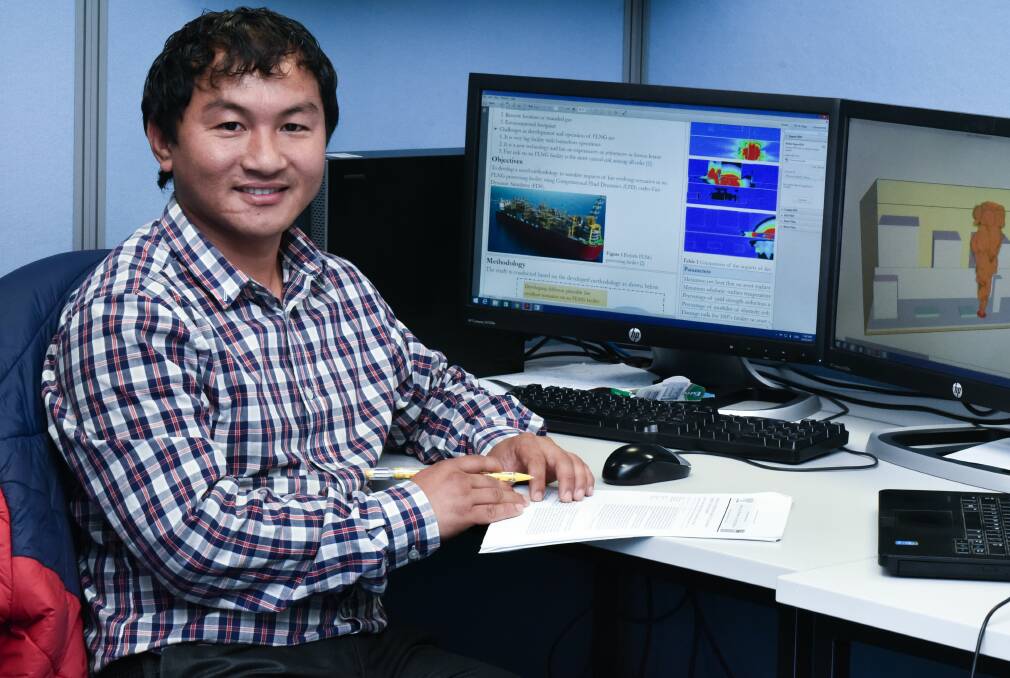 Energised: Til Baalisampang, PhD student at the Australian Maritime College, is studying the risk factors on Floating Liquified Natural Gas facilities. Picture: Neil Richardson