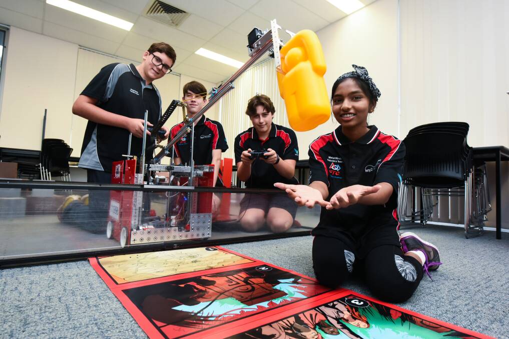 Drop: Malachi Capela, Hayden Walmsley, Oscar Kinman and Nihad Mohamad are preparing to compete in Texas with their handmade robot. Picture: Neil Richardson