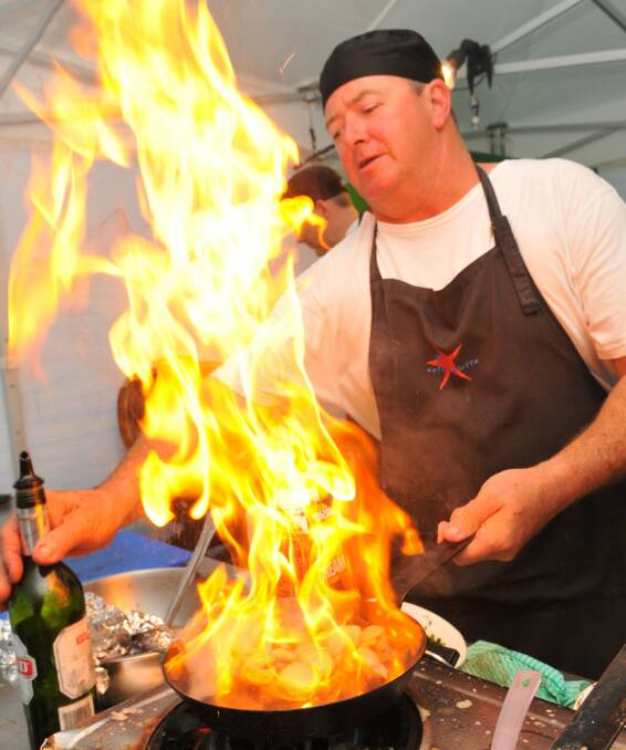 Mick Whatley cooks up a storm in the Old Cable Station / Stony Rise Wine stall at Festivale 2010. Picture: Scott Gelston