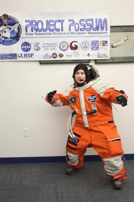 For science: Rose Tasker at Project PoSSUM in her flight suit. Picture: Supplied