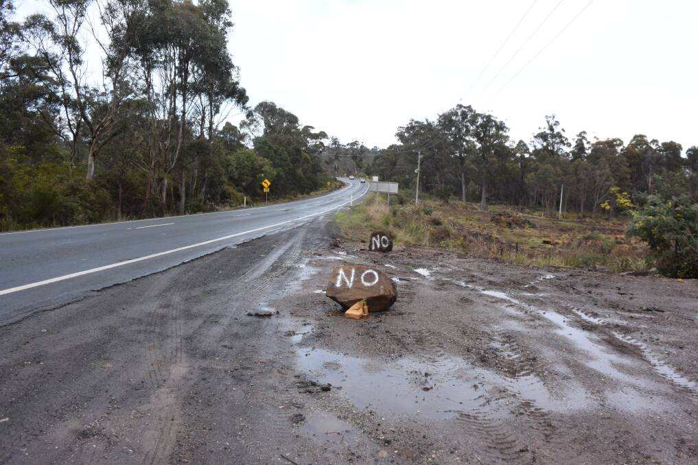 NO: The man has also spray painted 'no' onto rocks at his roadside property. Picture: Stefan Boscia