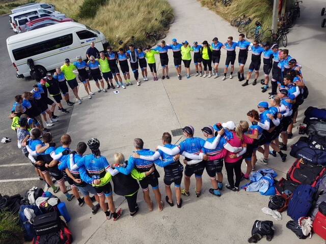 STAGE 1: The Smiddy riders gather to recap day one. Picture: Supplied