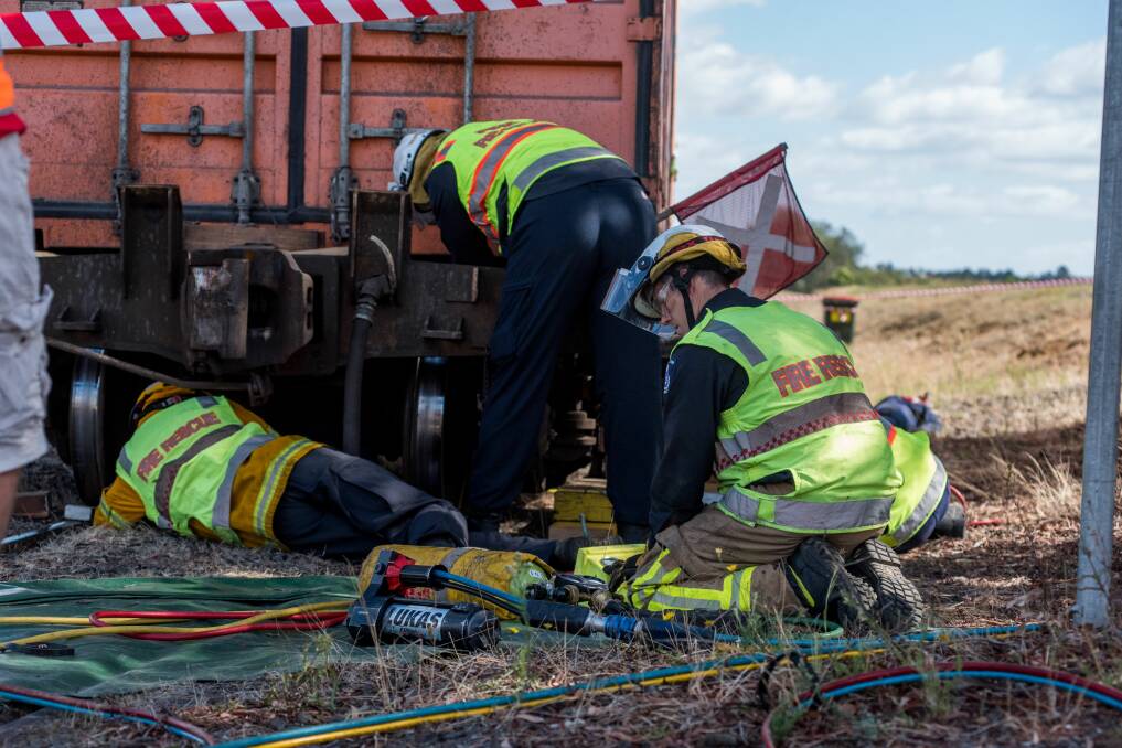 COMBINED EFFORT: 16 TFS crew members joined TasRail workers for the exercise. Picture: Neil Richardson