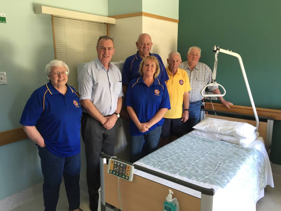 DONATION: Deloraine Lions club treasurer Bev Park, Deloraine Hospital's Lester Jones, Lions club secretary Angela Blackmore, president Eric Richardson, Lindsay Haberle and Phil Bryan with the new bed. Picture: Alan Blackmore