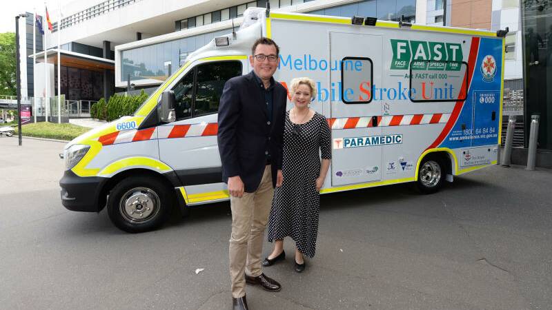 Victorian Premier Daniel Andrews and Health Minister Jill Hennessy unveil Australia's first stroke ambulance outside Royal Melbourne Hospital in Melbourne, Sunday, November 12, 2017. (AAP Image/Mal Fairclough)