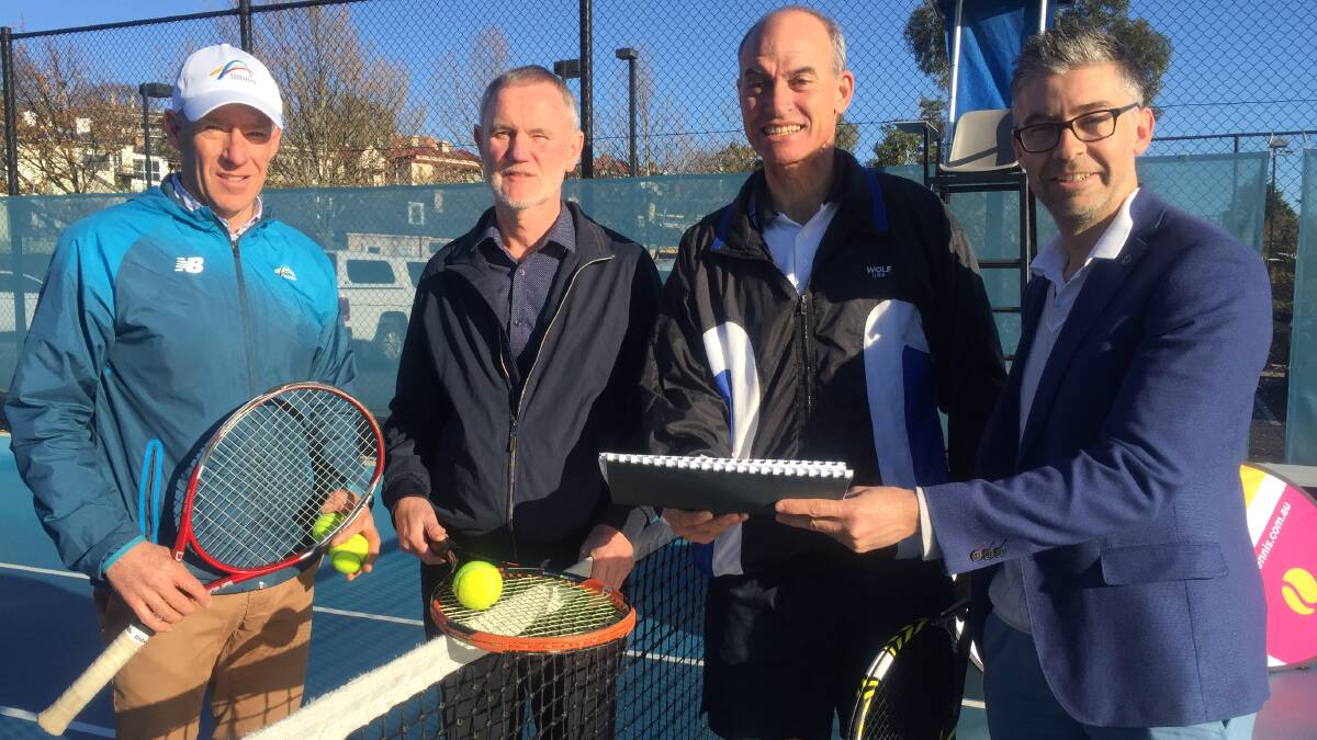 WINNER: Tennis Centre manager Andrew Youl, mayor Albert van Zetten, Liberal Lyons MP Guy Barnett and Tennis Tasmania's Darren Sturgess.