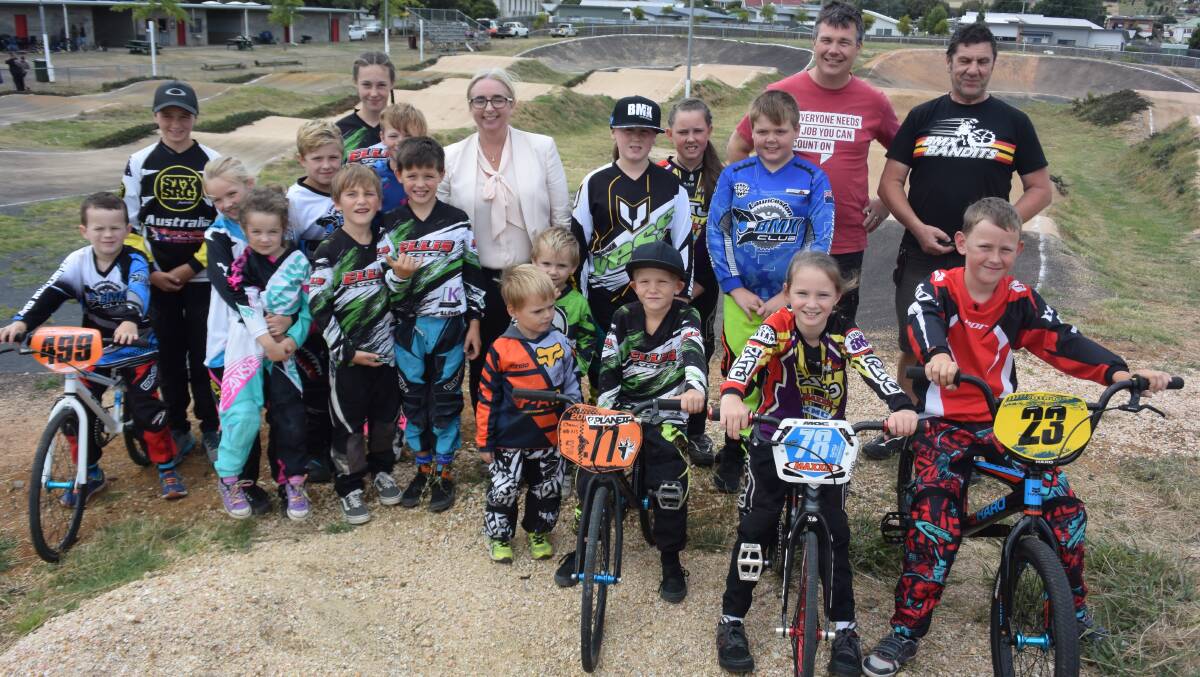 TRACK STARS: Deputy Opposition Leader Michelle O'Byrne (centre), Bass Labor candidate Adam Gore (second from right) with members of the Launceston BMX Club.