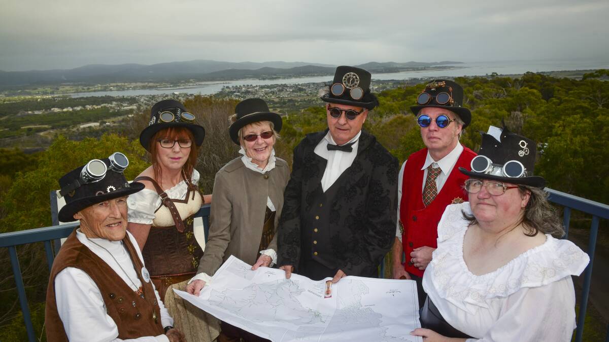 FULL STEAM AHEAD: Pat Webb, Rhonda O'Sign, Anne Cameron, Neal Uncle, James Cameron and Susan Uncle from the George Town Steampunk Tasmania Festival committee at the Mt George lookout at George Town. Picture: Paul Scambler.