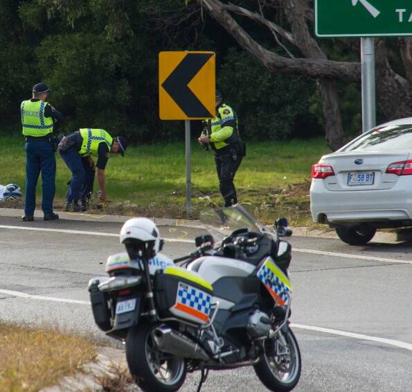 MOTORCYCLE CRASH: A man came off his motorcycle on the Bass Highway at Prospect on Sunday morning. Photo: Phillip Biggs