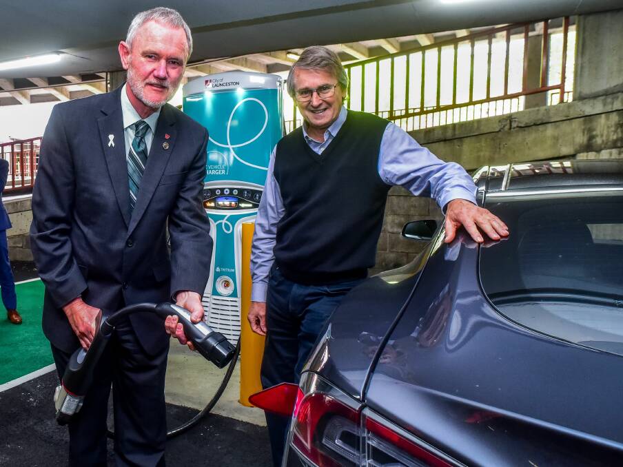 CHARGING UP: City of Launceston mayor Albert van Zetten with Australian Electric Vehicle Association vice president Clive Attwater. Picture: Neil Richardson