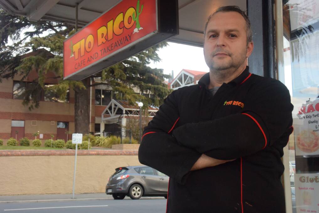 FINDING A VOICE: Tio Rico owner Jose Guardia outside the South American cafe which will host the Tasmanian Venezuelen community on Sunday.
