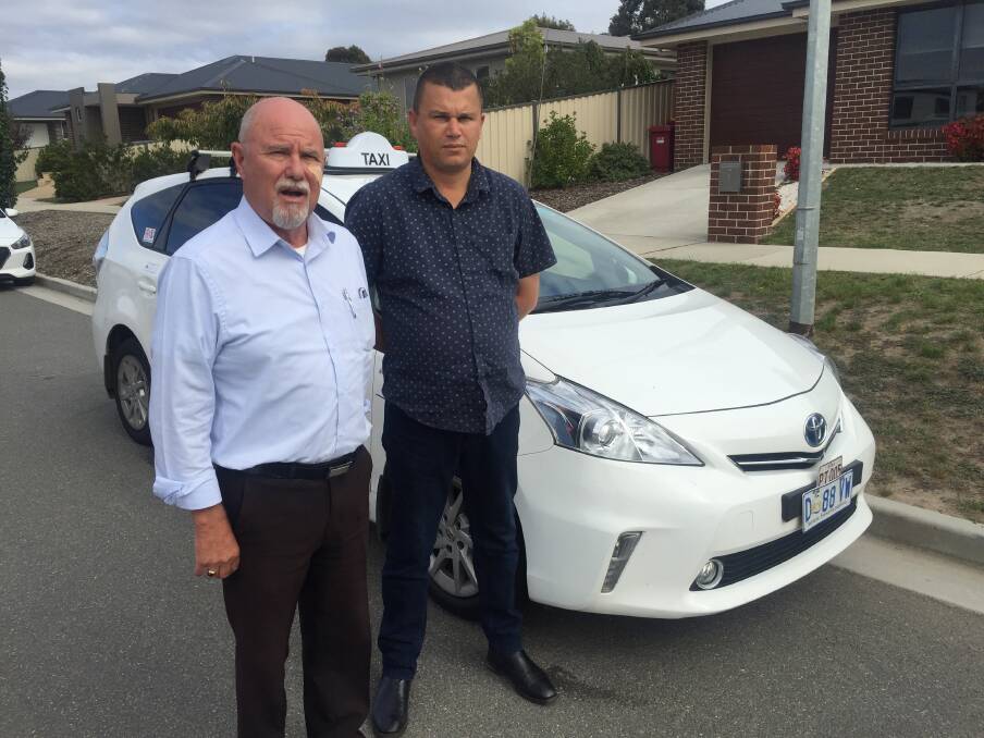 GAME CHANGER: Launceston independent taxi drivers Peter Chapman and Bert Lewis. The pair have spoken out ahead of Uber's expansion into Northern Tasmania.