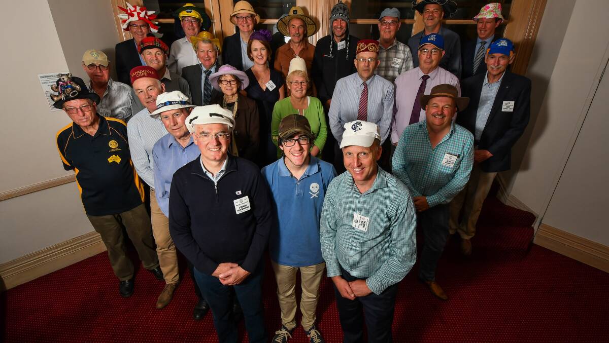 HATS OFF TO ROTARY: The Rotary Club of Central Launceston before its meeting on Monday. The group held a Hat Day to raise funds for Australian Rotary Health. Picture: Scott Gelston.