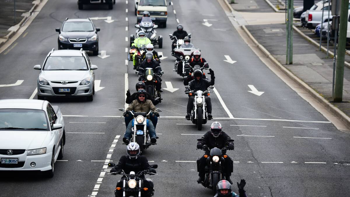 EASY RIDERS: Motorcycle riders make their way down Bathurst Street on Thursday as part of the 2017 Long Ride. Picture: Paul Scambler.