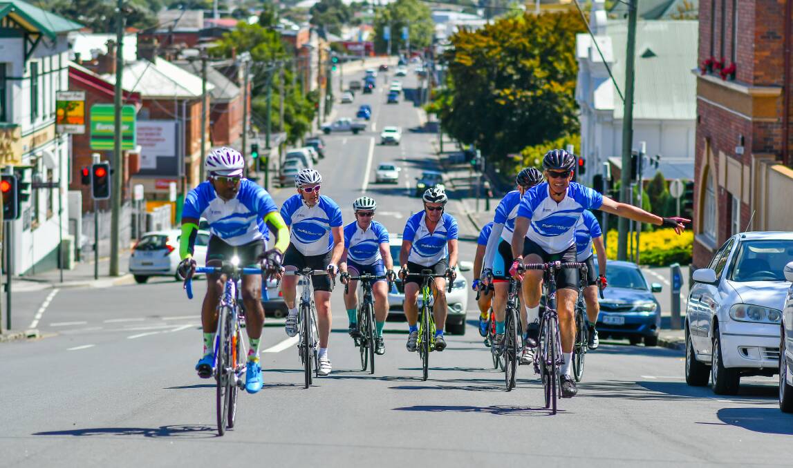 The Pollie-Pedal arrives, led by Launceston's Dario Lokai and MP Guy Barnett. Picture: Scott Gelston. 