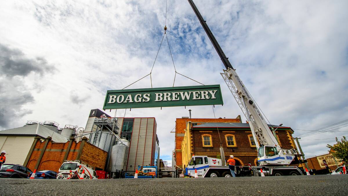 EXCITING: On Friday the Boag's Brewery sign was welcomed back to George Street after a full refurbishment. Pictures: Scott Gelston 