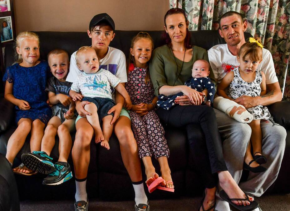 FAMILY: Parents Sarah Purcell and Adam Triffett with children Amali Rose, Jack, Seth Hutton,Tallis, Piper, Ollie and Timayia. Picture: Scott Gelston. 