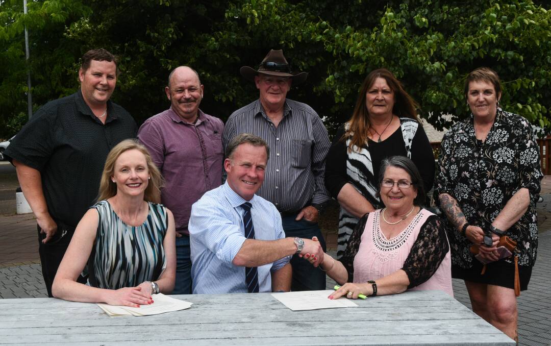 DEAL: TRACA representatives Brad Strong, Lee Prouse, John Clarke, Maxine Roughley, Di Baldock and Patsy Cameron with Bass Liberal MHA Sarah Courtney and Premier Will Hodgman. Picture: Neil Richardson