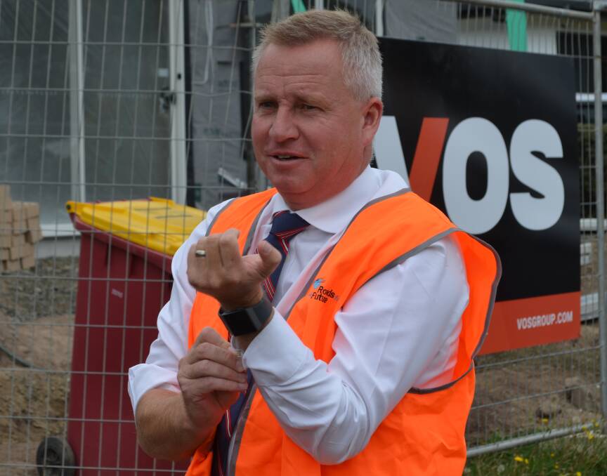 Deputy Premier Jeremy Rockliff rolled up his sleeves during an inspection of a public housing development at Punchbowl on Friday. Picture: Jessica Willlard 