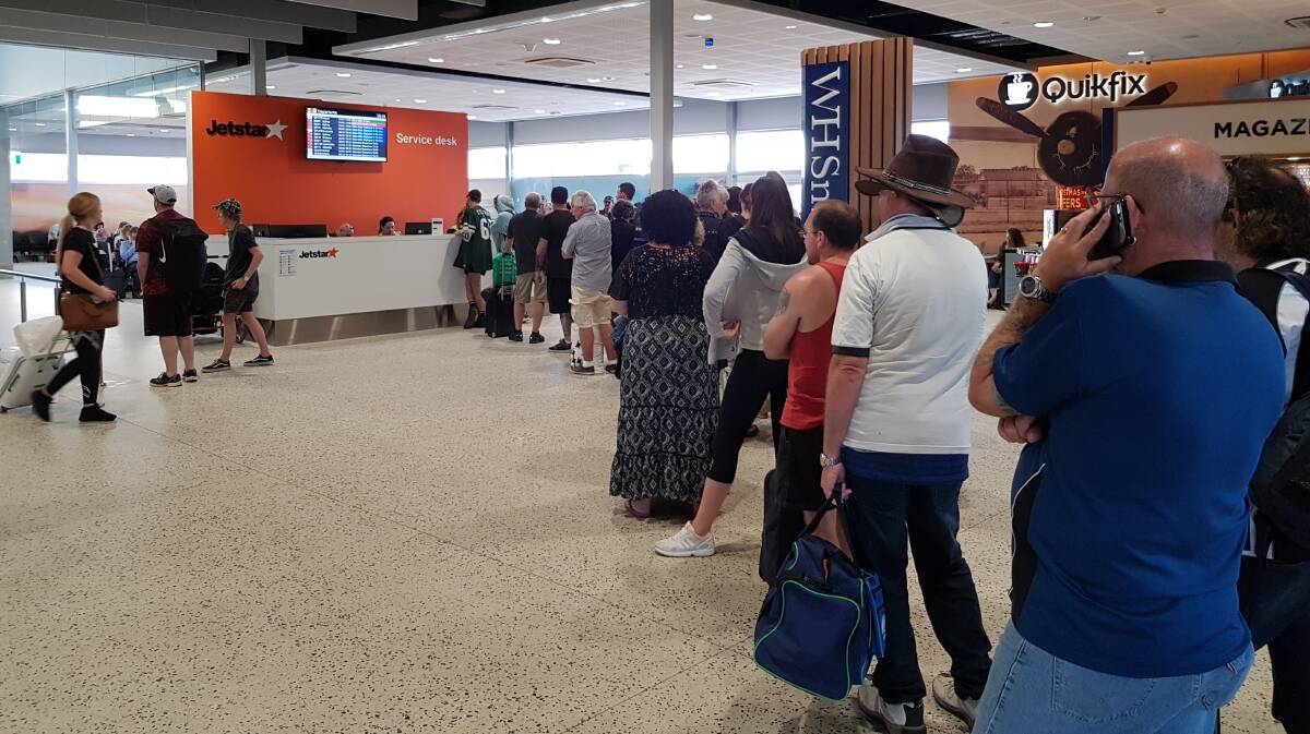Passengers waiting at Melbourne Tullamarine Airport after flight JQ741 from Melbourne to Launceston was forced to turn around mid-flight. Photo supplied by Robin Smith. 