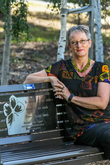 Bittersweet founder Lisa Bird, sits at the new chair located at Newstead Reserve. Picture: Phillip Biggs. 